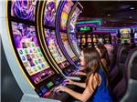 People playing on the slots at COUSHATTA LUXURY RV RESORT AT RED SHOES PARK - thumbnail
