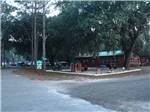 Playground in front of large campground building at RAGANS FAMILY CAMPGROUND - thumbnail
