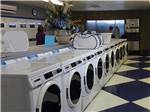 Laundry room with washers and dryers at FAR HORIZONS RV RESORT - thumbnail