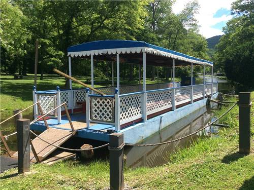 Trolley boat on lake at WATERSIDE CAMPGROUND & RV PARK