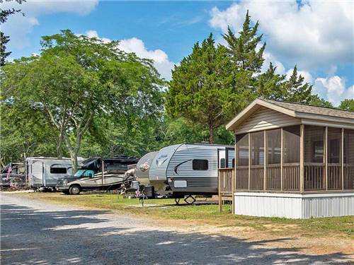Cabin, trailers and RVs camping at THOUSAND TRAILS CHESTNUT LAKE