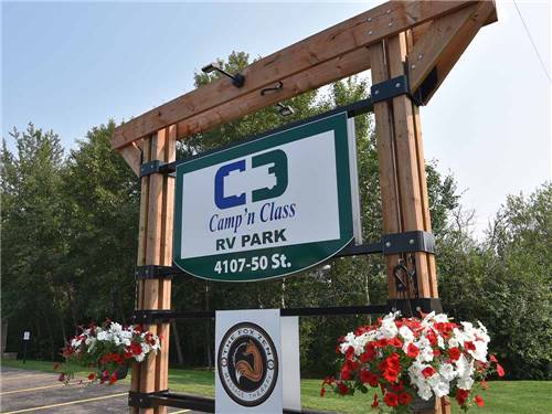 The front entrance sign at CAMP 'N CLASS RV PARK