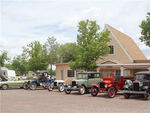 A row of classic cars in front of the main building at GRAND CANYON VIEW RV