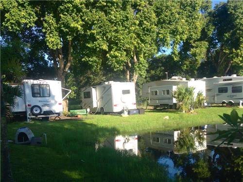 Trailers at campsite at LAZY J RV & MOBILE HOME PARK