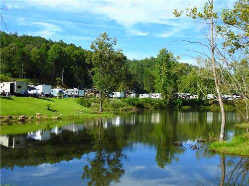 The RV sites along the water at VALLEY RIVER RV RESORT