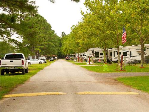 Street lined with trailers camping at campsite at THOUSAND TRAILS HARBOR VIEW