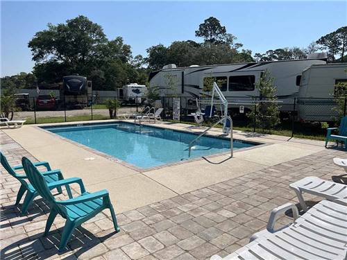 The swimming pool area at PANACEA RV PARK