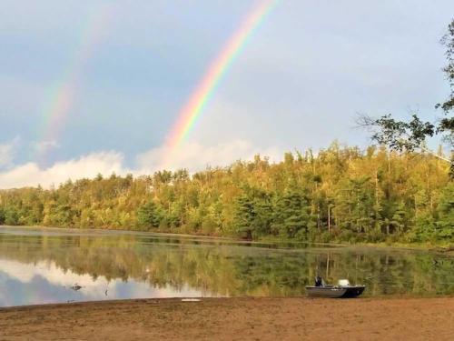 Two rainbows over the lake at QUINEBAUG COVE RESORT