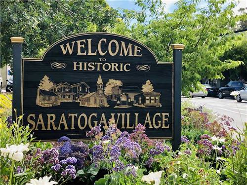The Welcome to Historic Saratoga Village sign nearby at SARATOGA SPRINGS