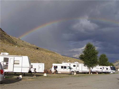 A rainbow over RV sites at YELLOWSTONE RV PARK