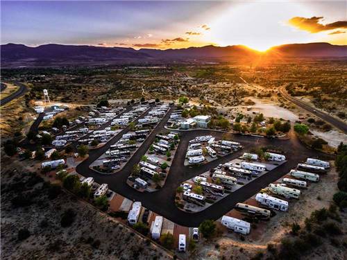 An aerial view of the campground at dusk at DISTANT DRUMS RV RESORT