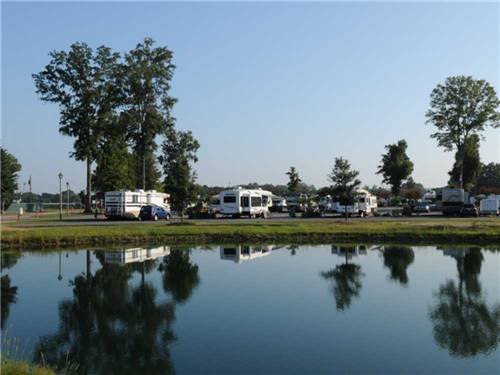 RV sites by the lake at CAPITAL CITY RV PARK