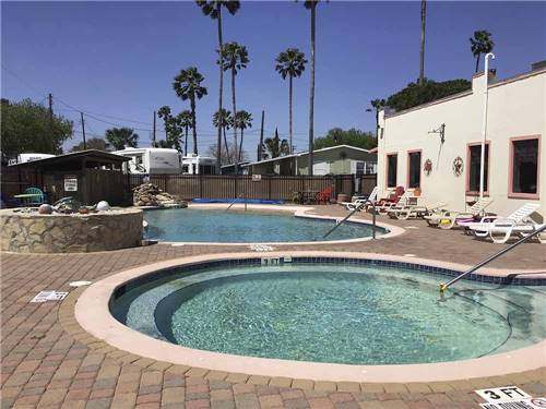 The hot tub and swimming pool at PALM GARDENS 55 + MH & RV RESORT