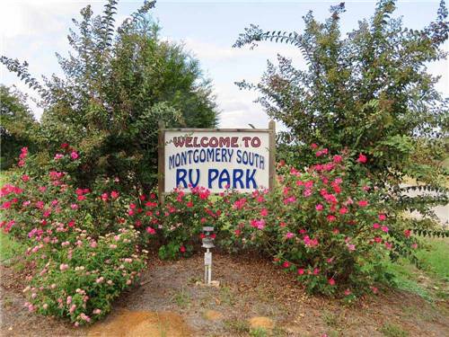 Welcome sign at the park entrance at MONTGOMERY SOUTH RV PARK & CABINS