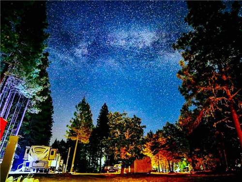 Trailers parked under the starlight at LONE MOUNTAIN RESORT