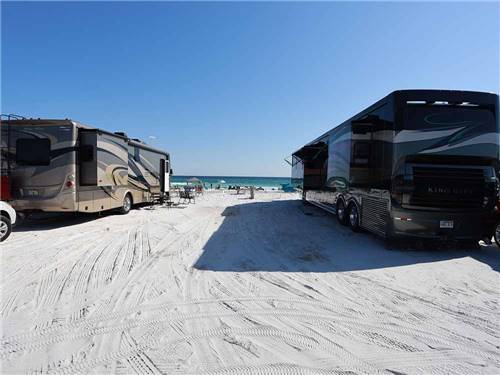 Motorhomes on the beach at CAMPING ON THE GULF