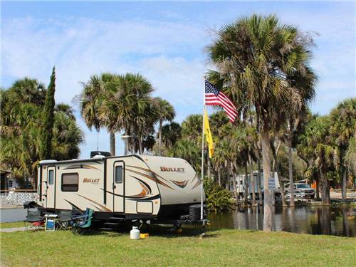Trailer camping on the water at ENCORE RAMBLERS REST