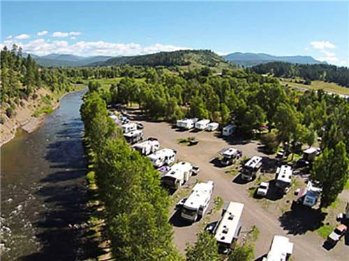 Aerial view over RV campground and stream at PAGOSA RIVERSIDE CAMPGROUND