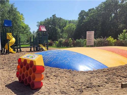 The jumping pillows and playground at BARABOO RV RESORT BY RJOURNEY