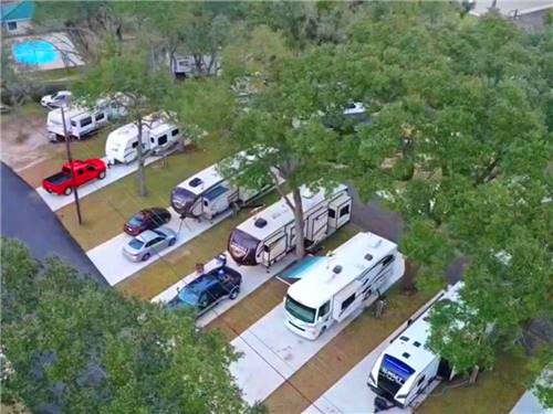 Aerial view of RV parked in paved sites at I-10 KAMPGROUND