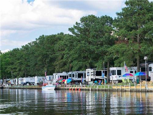 Trailers camping on lake at TWIN LAKES RESORT