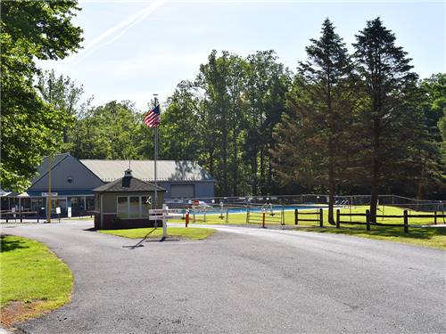 The front entrance hub with flag at PINCH POND FAMILY CAMPGROUND