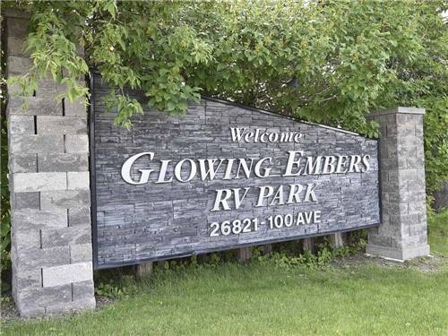 Sign at the park entrance at GLOWING EMBERS RV PARK & TRAVEL CENTRE