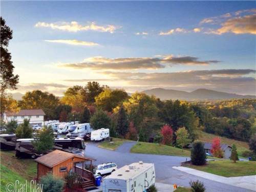 View of park and hills at sunset at ASHEVILLE BEAR CREEK RV PARK