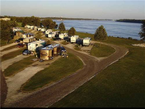 RV sites along the water at TOM SAWYER'S RV PARK