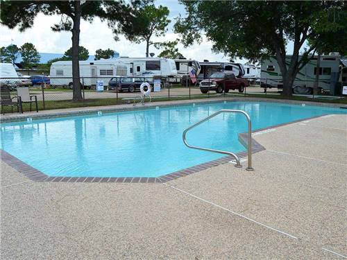 The swimming pool area at TRADERS VILLAGE RV PARK