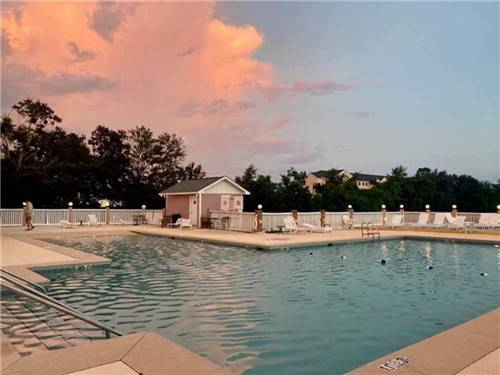 The swimming pool at dusk at GULF BREEZE RV RESORT