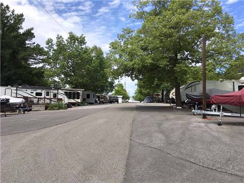 A road with RVs running along both sides at OUTBACK RV RESORT