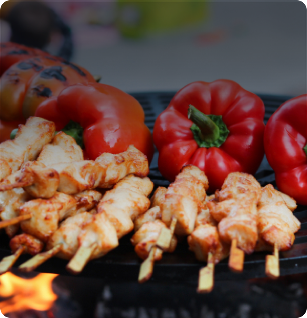 Chicken and peppers on the grill