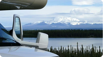 Image of an RV overlooking a lake