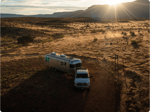 Towable RV at sunset