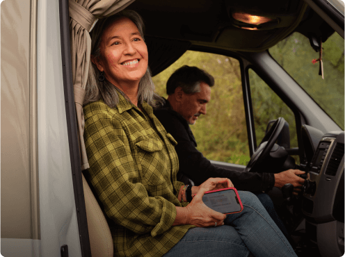 Woman in the passenger seat of a motorhome