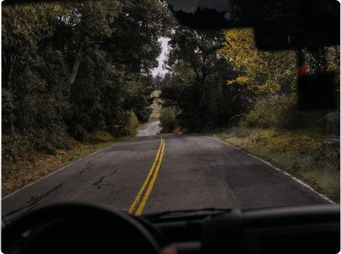 Vehicle driving down a road