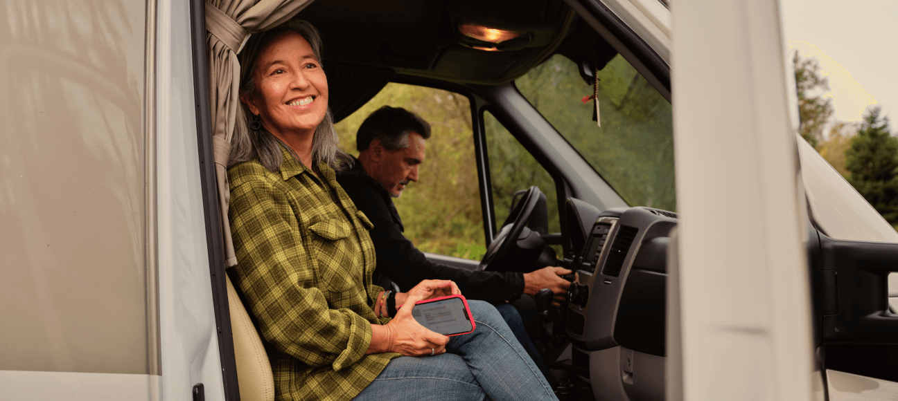 Woman in the passenger seat of a motorhome