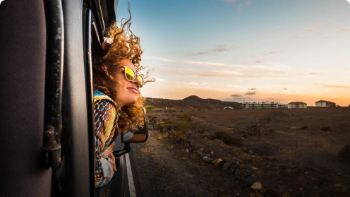 Woman enjoying view from RV