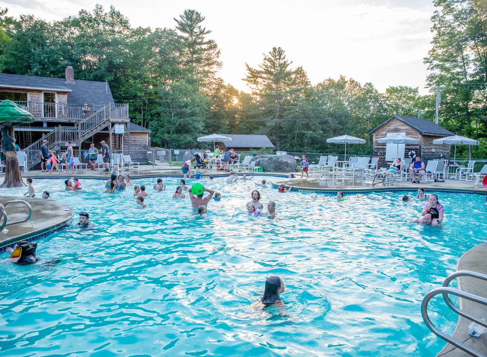 People playing in the large pool