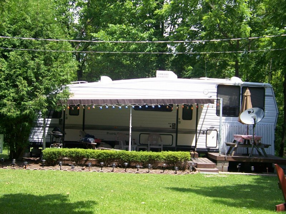 RV with awning and lights