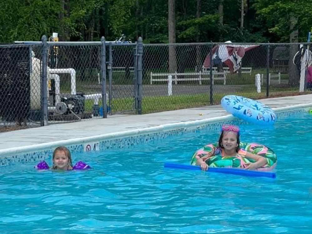 Girls playing in the pool at SOUTH FORTY RV CAMPGROUND