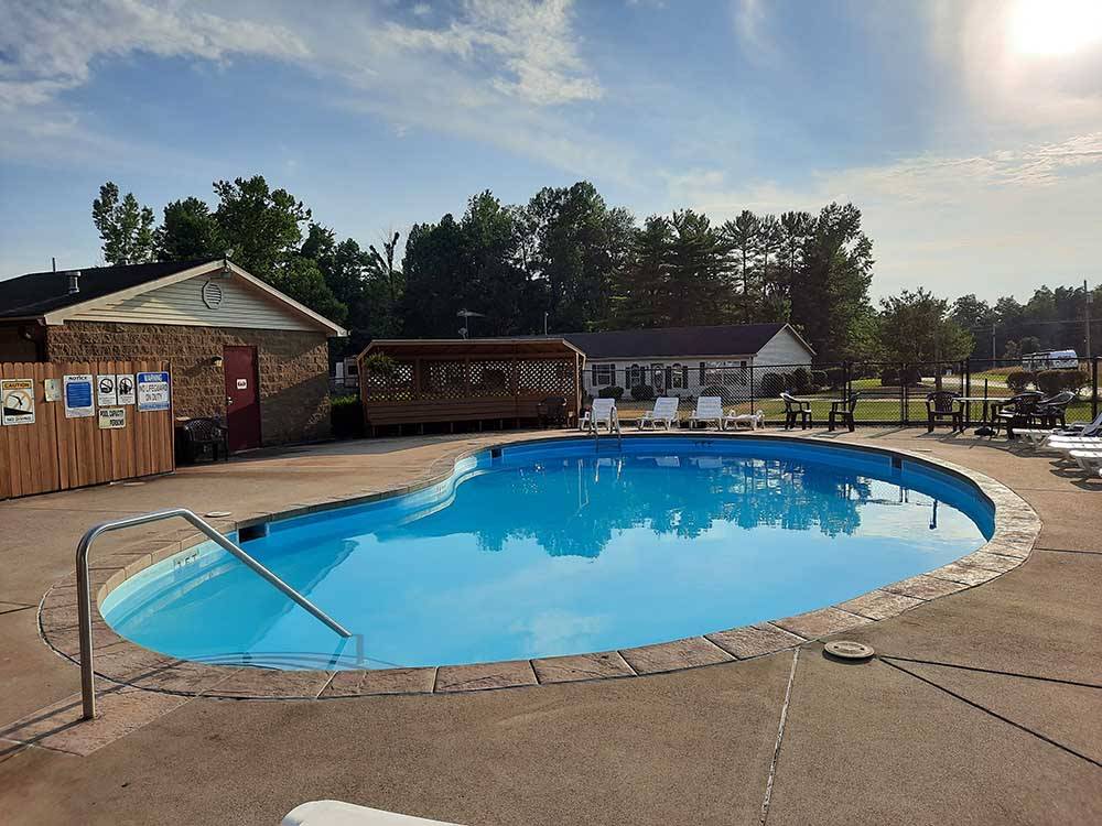 Clean swimming pool for guests at COLUMBUS WOODS-N-WATERS KAMPGROUND