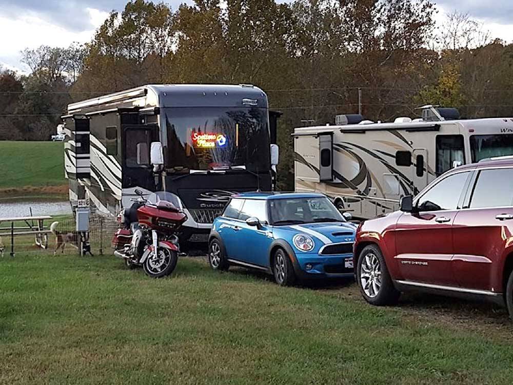 Mini Cooper, motorcycle and RV at GREENVILLE FARM FAMILY CAMPGROUND