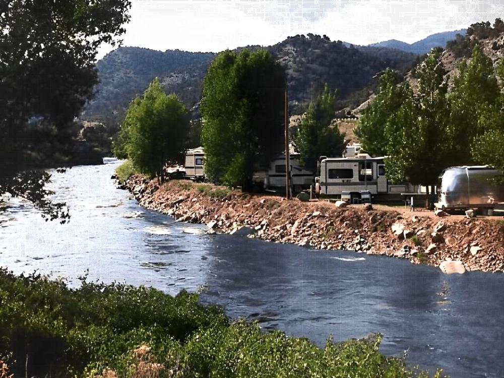 View of the water by RV spots at Four Seasons RV Resort