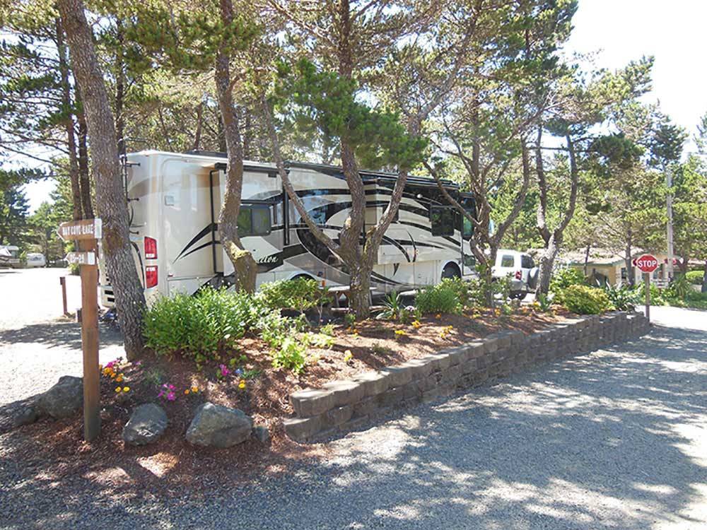 RV at campsite at SEA & SAND RV PARK