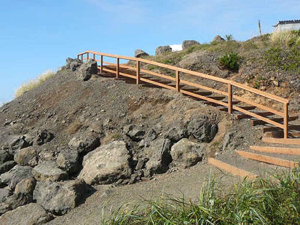 Stairs leading to beach at SEA & SAND RV PARK