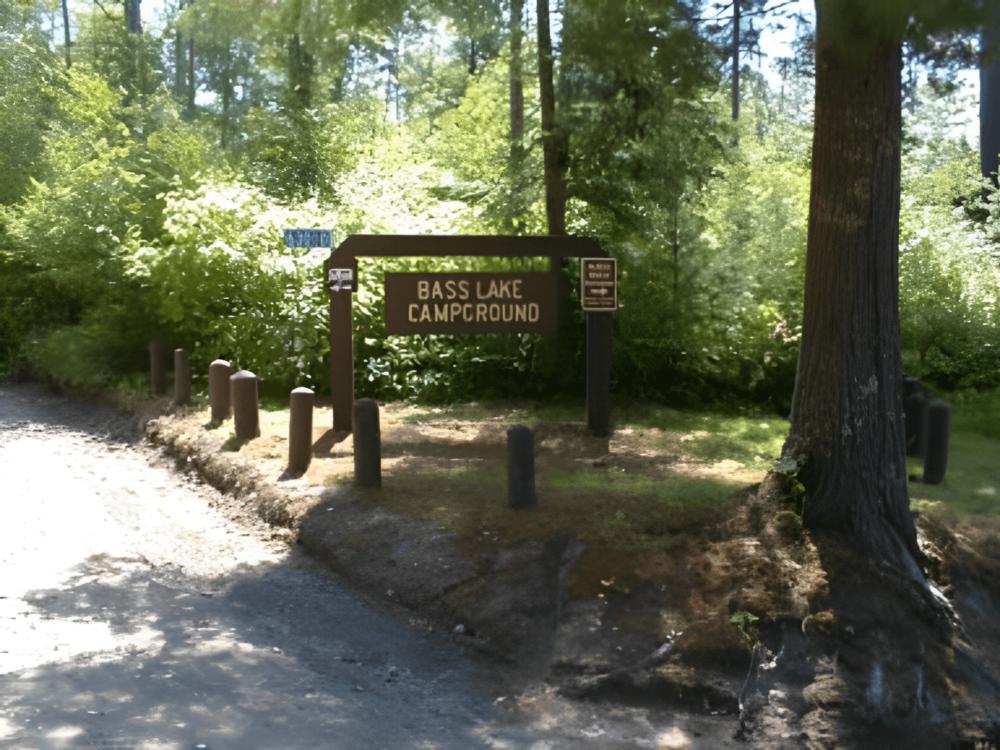 Welcome sign at site Bass Lake