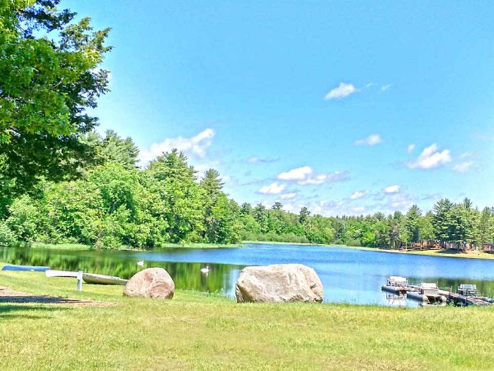 View of the lake and dock at LAKE OF THE WOODS CAMPGROUND