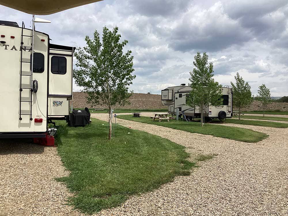 A row of gravel pull thru RV sites at RUBY VALLEY CAMPGROUND & RV PARK